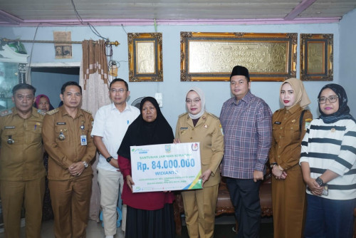 cover Bersama BPJS dan KPU, Pemkot Jambi Santuni Petugas KPPS, Pj Wali Kota : "Bukti Negara Hadir"